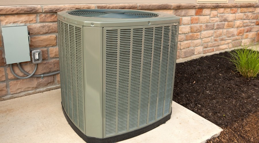 Modern air conditioning unit and potential efficiency issues.